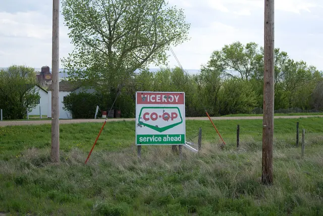 Viceroy Co-op sign with grain elevator in background